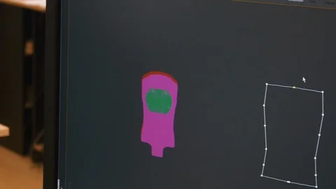 Computer engineer creates technological detail on computer Stock Footage 121224501