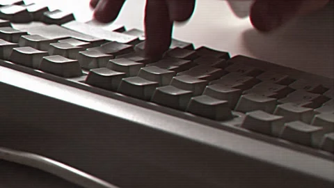 Computer engineer developer is working on old vintage computer 1990s. Antique Stock Footage 249456270