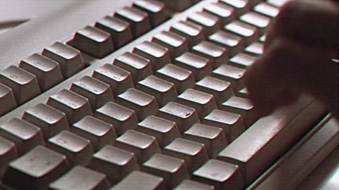 Computer engineer developer is working on old vintage computer 1990s. Antique Stock Footage 252728616