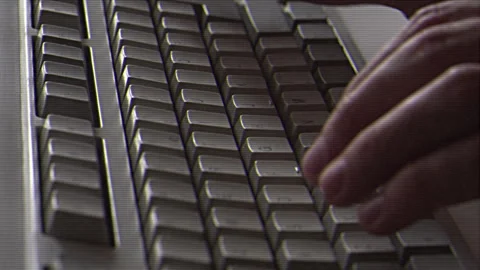 Computer engineer developer is working on old vintage computer 1990s. Antique Stock Footage 260819068