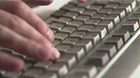 Computer engineer developer is working on old vintage computer 1990s. Antique Stock Footage 263050661