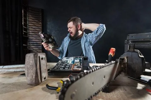 Computer engineer fixing problem with hardware 写真素材