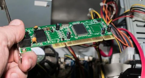 Computer engineer installs a working unit Stock Photos