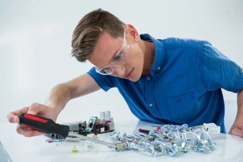 Computer engineer repairing computer motherboard Stock Photos
