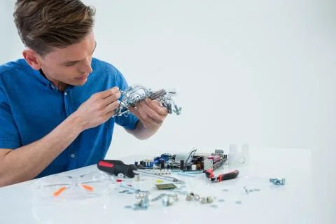 Computer engineer repairing computer motherboard Stock Photos