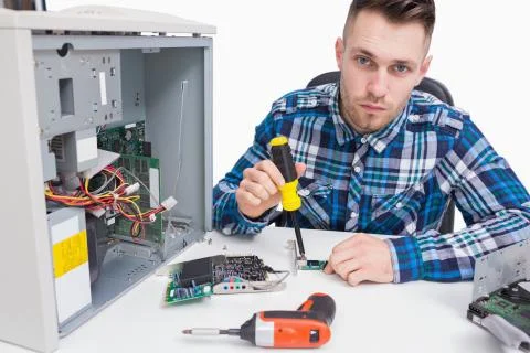 Computer engineer repairing cpu Stock Photos