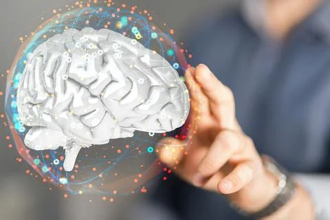 A computer engineer tapping on a 3d rendering of a brain hologram with interc Fotos de archivo