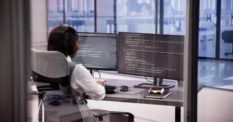 Computer engineer using code to develop web software Stock Photos