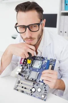 Computer engineer working on broken cpu Foto stock