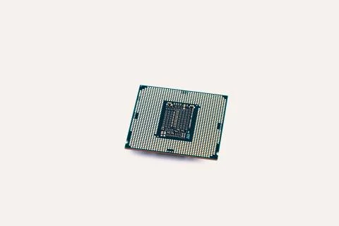 Computer engineering Microprocessor processor isolated on white background. Stock Photos