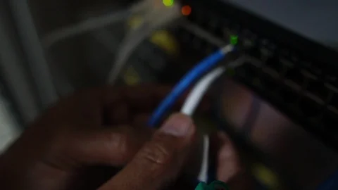 Computer engineers are repairing a network hub switch  Video stock 114970216