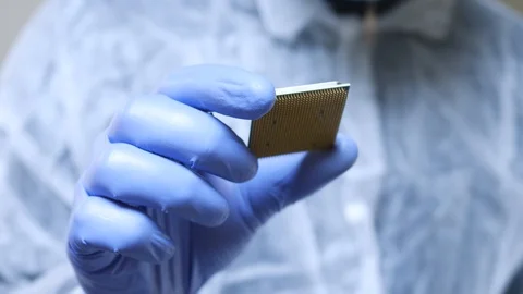 Computer Engineer's Hand is Holding CPU Computer Video stock 106382584