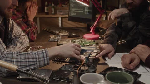 Computer Engineers Working with Motherboards in Workshop Stock Footage 263298778