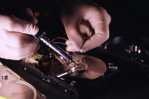 Computer equipment. Repair of PC components. Hard drive for restoration in .. Stock Photos
