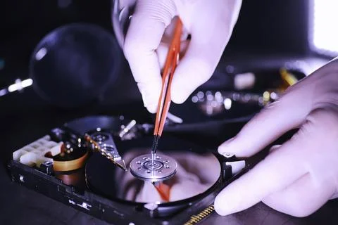 Computer equipment. Repair of PC components. Hard drive for restoration in .. Stock Photos