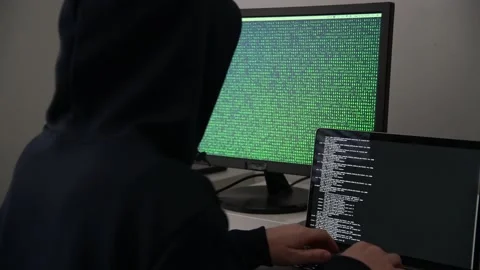 Computer expert hacker use technical knowledge to break into a computerized s Stock Footage 152352446