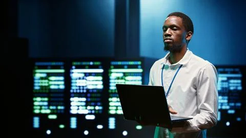 Computer expert patching server network Stock Photos