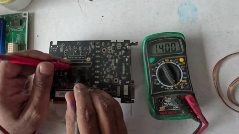 Computer expert repairing graphic card Stock Footage 247818557