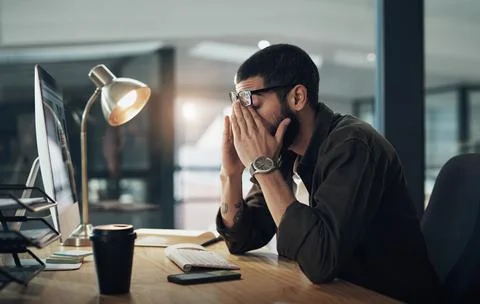 Computer, eye strain and headache with man in office for website coding or Foto stock