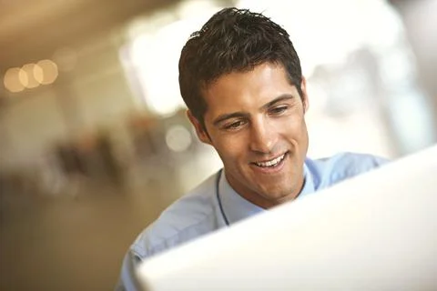 Computer, face and blurred background with a business man at work on a project Stock Photos