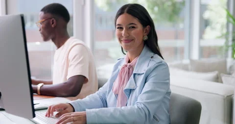 Computer, face and smile of designer woman in coworking office for research or Stock Footage 329397537