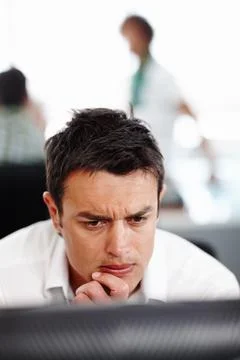 Computer, face and thinking with business man in office for problem solving or Stock Photos
