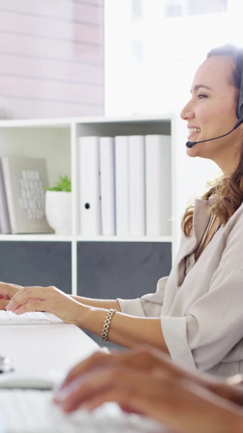 Computer, face and woman with microphone in call center for IT help desk Stock Footage 334944066