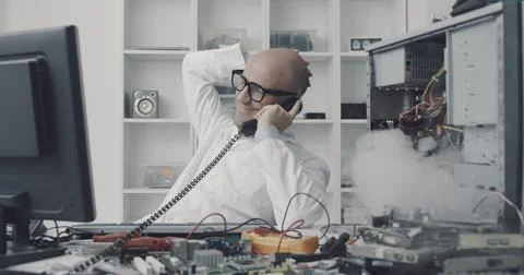 Computer failure in the technician office Stock Photos