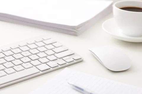 Computer, files and coffee on office desk Stock Photos