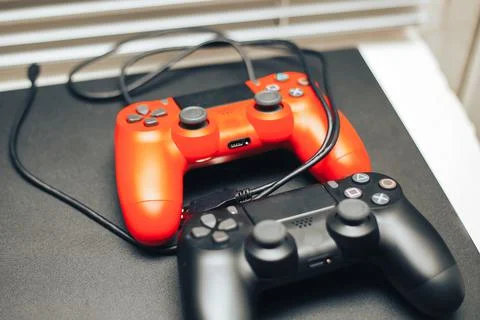 Computer game competition. Gaming concept. red and black joysticks on black Stock Photos
