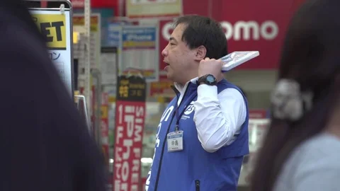 Computer Game Salesman, Tokyo Stock Footage 74168650