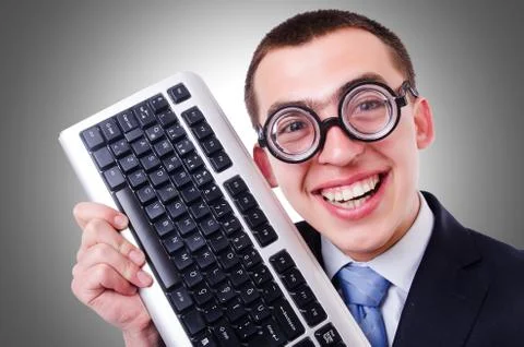 Computer geek nerd in funny concept Stock Photos