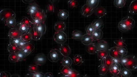 Computer generated atoms coming together for nuclear fusion Stock Footage 72901569