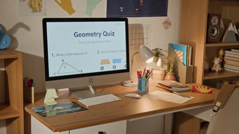 Computer with Geometry Test on Study Desk in Child Bedroom Stock Footage 334968336