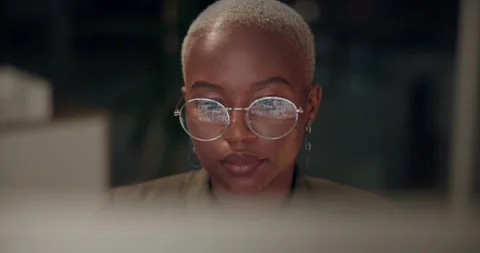 Computer, glasses and web design with developer woman in office at night for Stock Footage 280543972