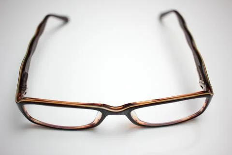 Computer Glasses  in brown frame on a white background Stock Photos