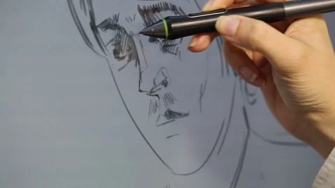 Computer graphic artist working with drawing tablet for computer. Stock Footage 81471431