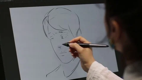 Computer graphic artist working with drawing tablet for computer. Stock Footage 81471486