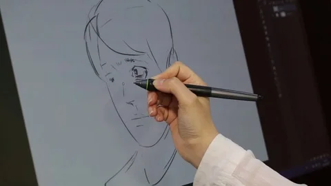 Computer graphic artist working with drawing tablet for computer. Stock Footage 81471581