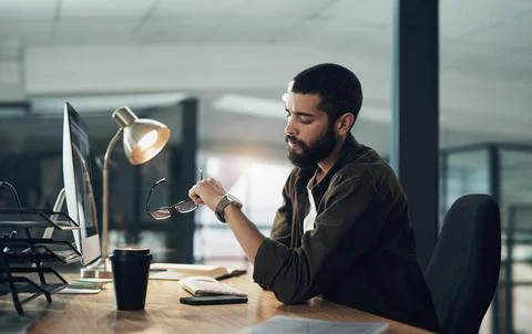 Computer, graphic design and watch with man in office for website coding or Stock Photos