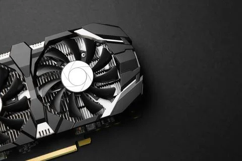 Computer graphics card on black background, top view. Space for text Foto stock