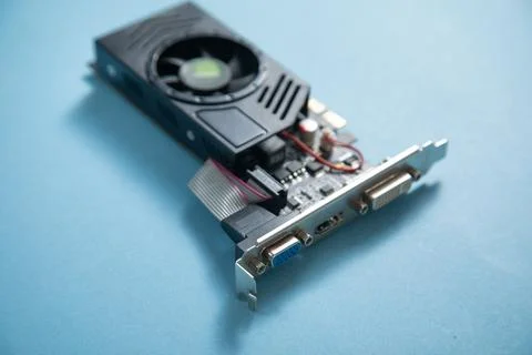 Computer graphics card on the blue background. Stock Photos