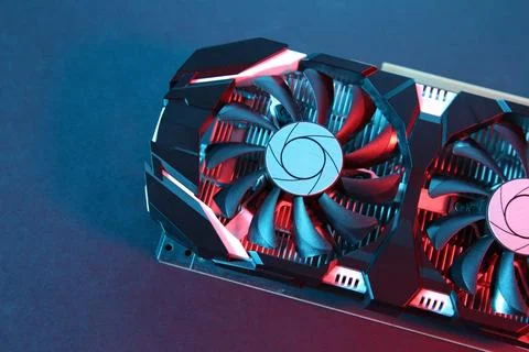 Computer graphics card on color background, top view. Space for text Stock Photos