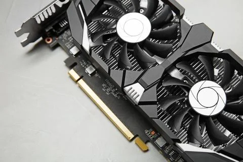 Computer graphics card on gray textured background, above view Foto stock