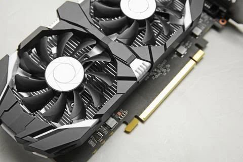 Computer graphics card on gray textured background, above view Stock Photos