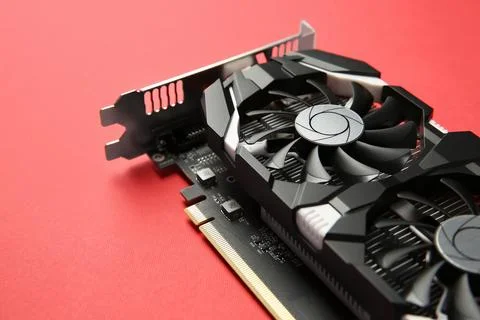 Computer graphics card on red background, closeup Stock Photos
