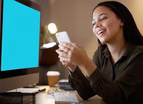 Computer, green screen mockup or woman with phone in office at night for social Stock Photos