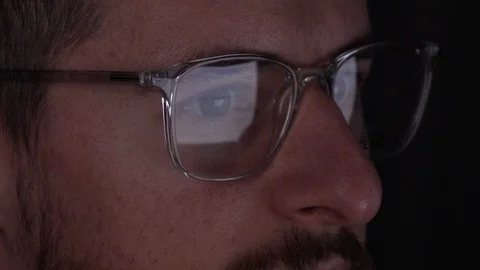 Computer hacker checking developer codes in the dark, closeup Stock Footage 125271114