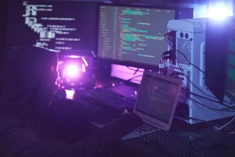 Computer Hacker Coding in Dark Stock Photos