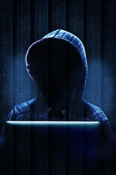 Computer Hacker Committing Cybercrime Foto stock